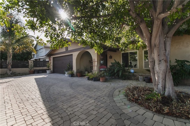 view of front of home with a garage