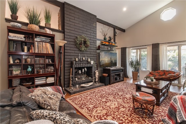 living room with high vaulted ceiling, a fireplace, and hardwood / wood-style flooring