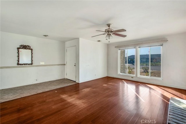 unfurnished room featuring ceiling fan and light hardwood / wood-style floors