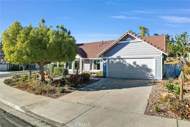 ranch-style house featuring a garage