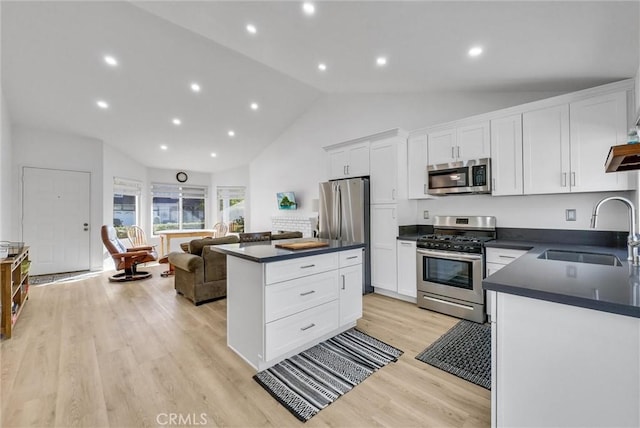 kitchen with white cabinets, sink, and stainless steel appliances