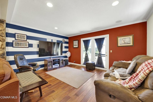 living room featuring ornamental molding and wood-type flooring