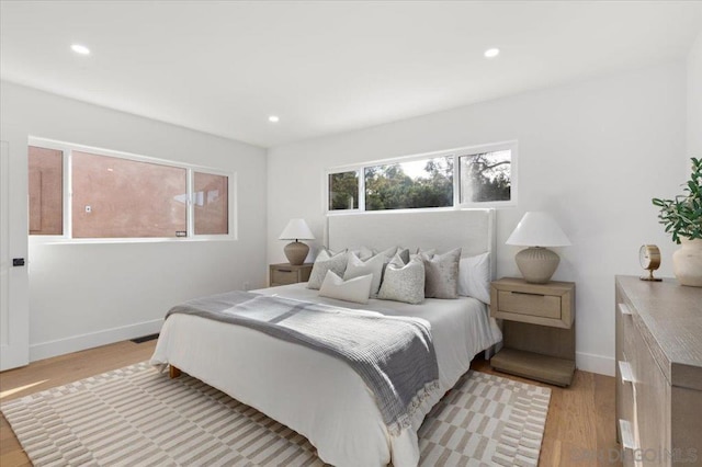 bedroom featuring light hardwood / wood-style flooring