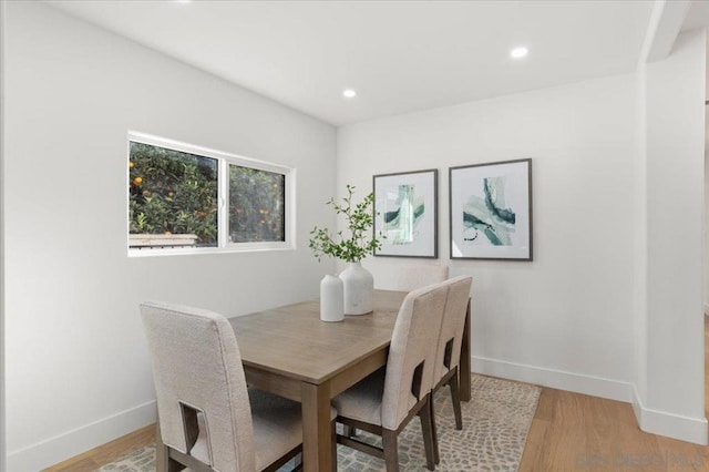 dining room featuring wood-type flooring