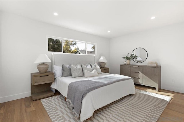 bedroom with light wood-type flooring