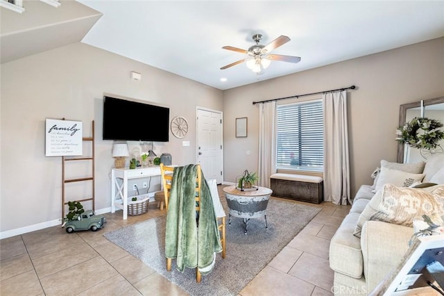 tiled living room with ceiling fan