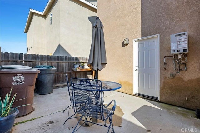 view of patio / terrace with water heater