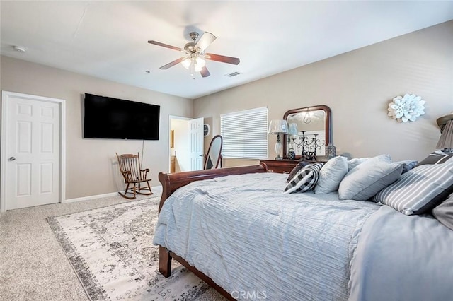 carpeted bedroom with ceiling fan