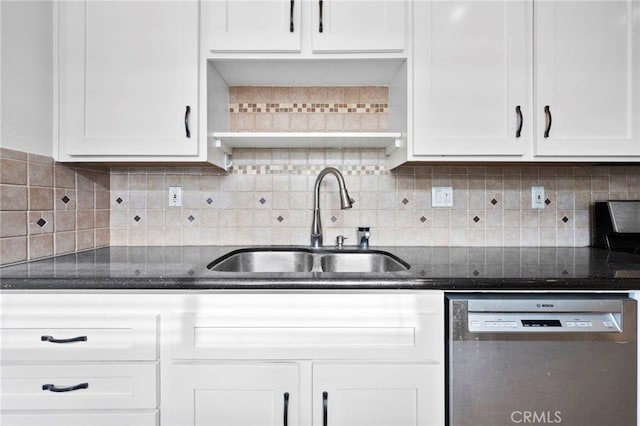 kitchen featuring white cabinets, dishwasher, and tasteful backsplash