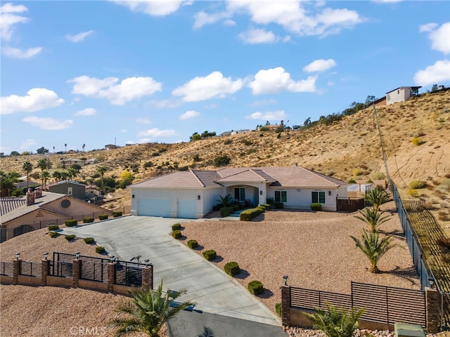 single story home featuring a garage