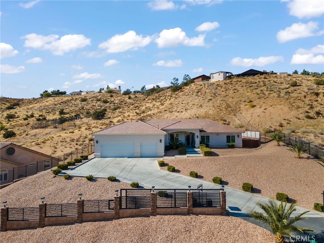 single story home with a garage