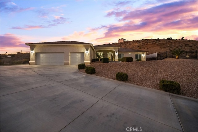 view of front of property with a garage