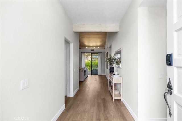 hall with light hardwood / wood-style floors