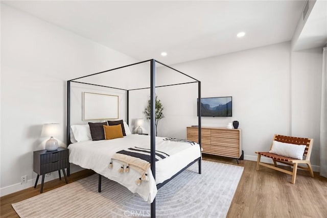 bedroom featuring light hardwood / wood-style flooring