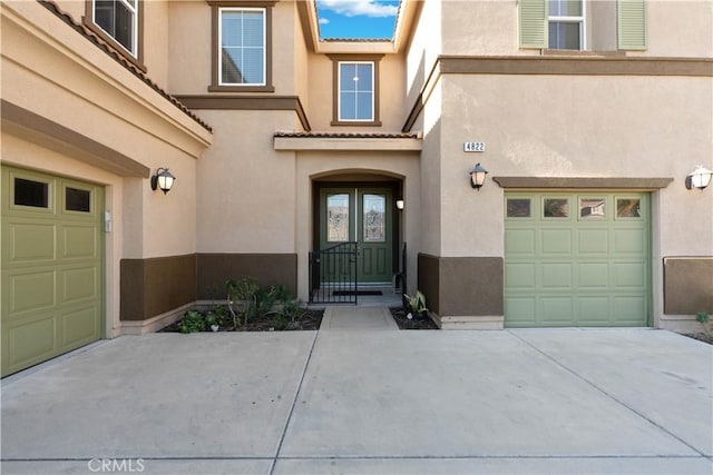 property entrance featuring a garage