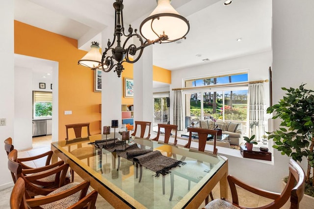 dining area with a notable chandelier