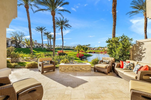 view of patio featuring an outdoor living space and a water view