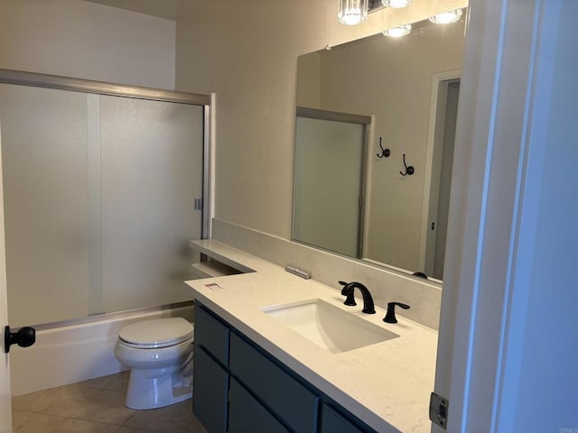 4115 Cyprus Island Ct, Fallbrook, CA 92028 - full bathroom with tile patterned floors, toilet, vanity, and bath / shower combo with glass door