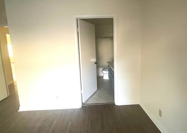 4115 Cyprus Island Ct, Fallbrook, CA 92028 - unfurnished bedroom featuring dark wood-type flooring and baseboards