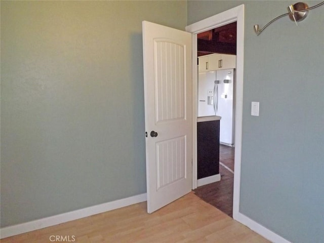 empty room with light wood-type flooring