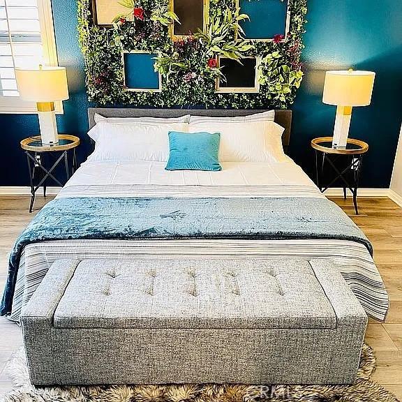 bedroom featuring hardwood / wood-style flooring