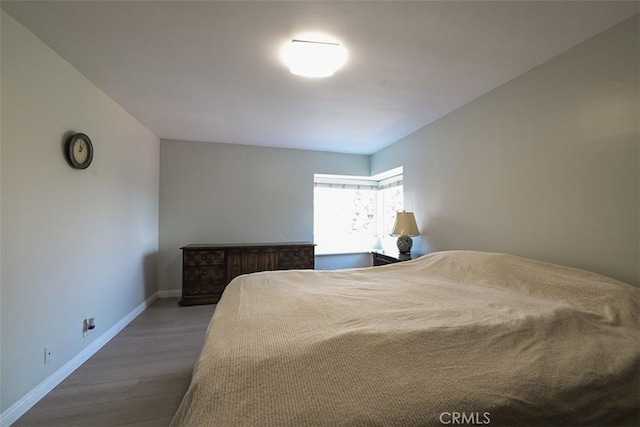 bedroom featuring hardwood / wood-style flooring