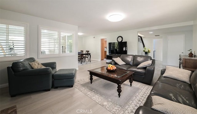 living room featuring light wood-type flooring