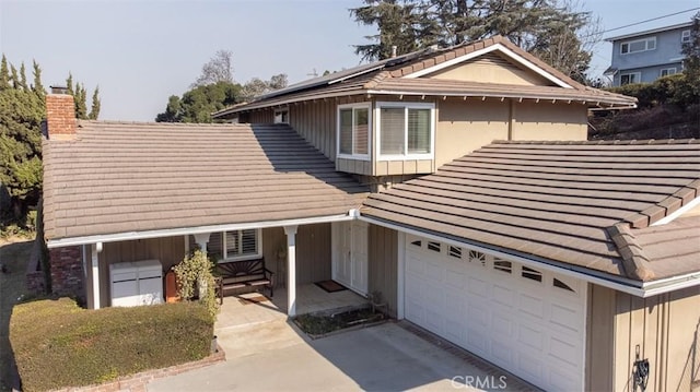 view of front of property with a garage