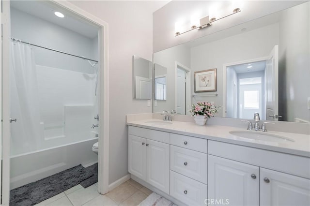 full bathroom with tile patterned flooring, toilet, vanity, and shower / bath combination with curtain