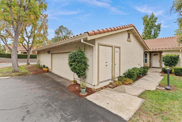 view of home's exterior featuring a garage