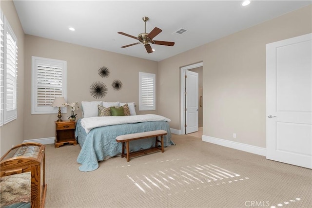 carpeted bedroom featuring ceiling fan