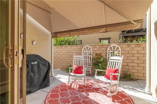 view of patio / terrace featuring a gazebo and area for grilling