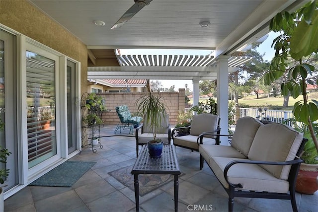 view of patio with an outdoor hangout area and a pergola