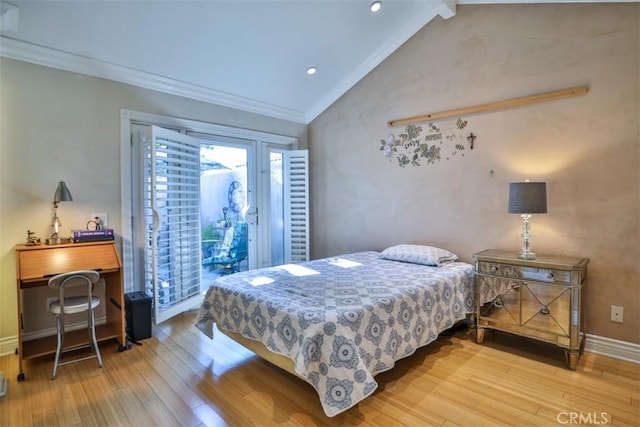 bedroom featuring wood-type flooring, ornamental molding, and lofted ceiling with beams