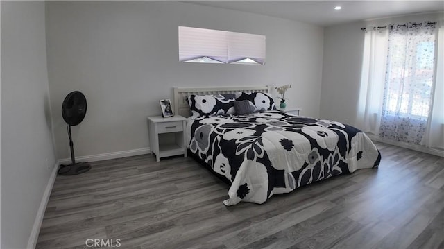 bedroom featuring dark wood-type flooring