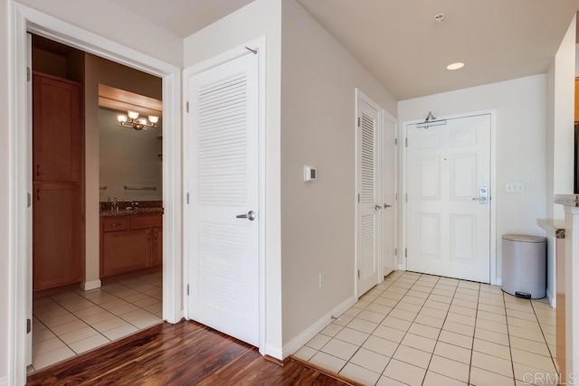 hallway with light tile patterned floors