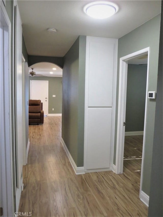 corridor featuring light hardwood / wood-style floors