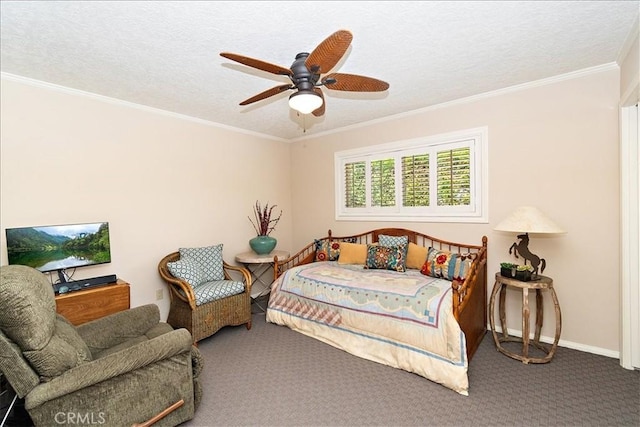 bedroom featuring ceiling fan, a textured ceiling, and carpet flooring