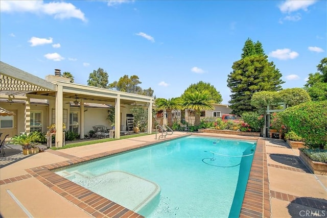 view of pool featuring ceiling fan and a patio