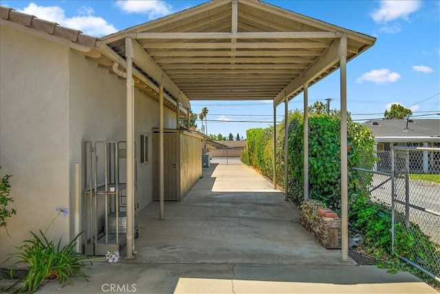 view of patio / terrace featuring a carport