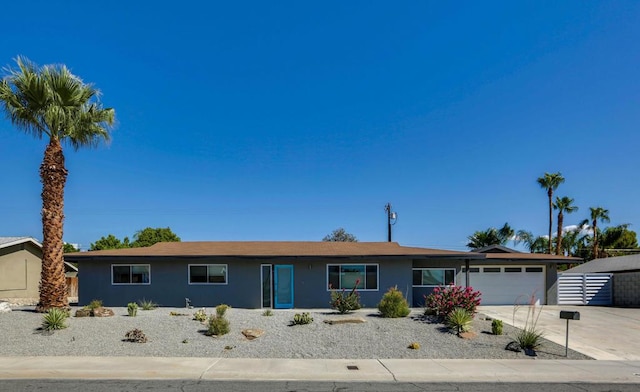 ranch-style home with a garage