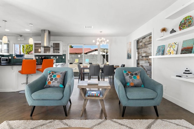 living room with an inviting chandelier