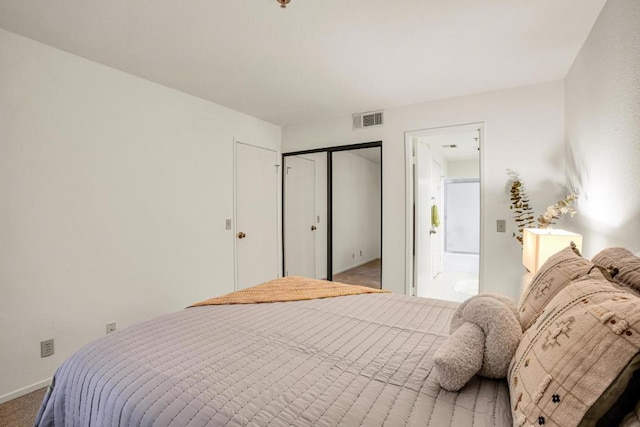 bedroom featuring a closet and carpet