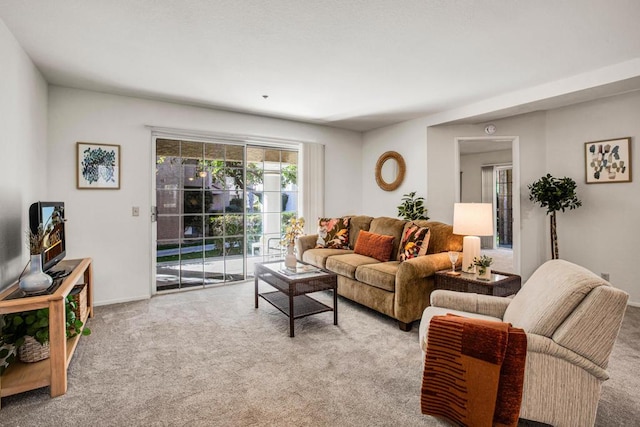 living room featuring light carpet