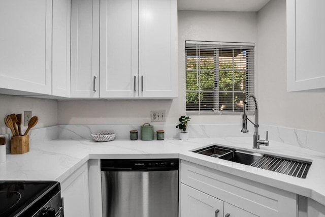 kitchen featuring stainless steel dishwasher, light stone countertops, sink, and white cabinetry