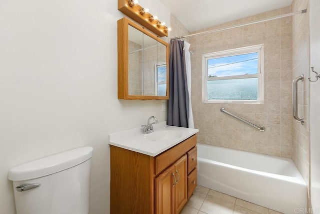 full bathroom featuring toilet, vanity, tile patterned flooring, and shower / bathtub combination with curtain