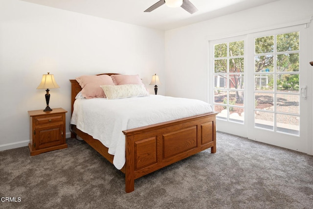 bedroom featuring ceiling fan and dark colored carpet