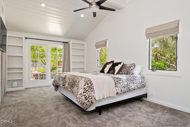 bedroom featuring ceiling fan, carpet, and lofted ceiling