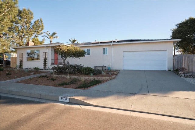 ranch-style house featuring a garage