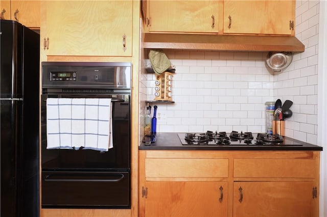 kitchen with decorative backsplash and black appliances